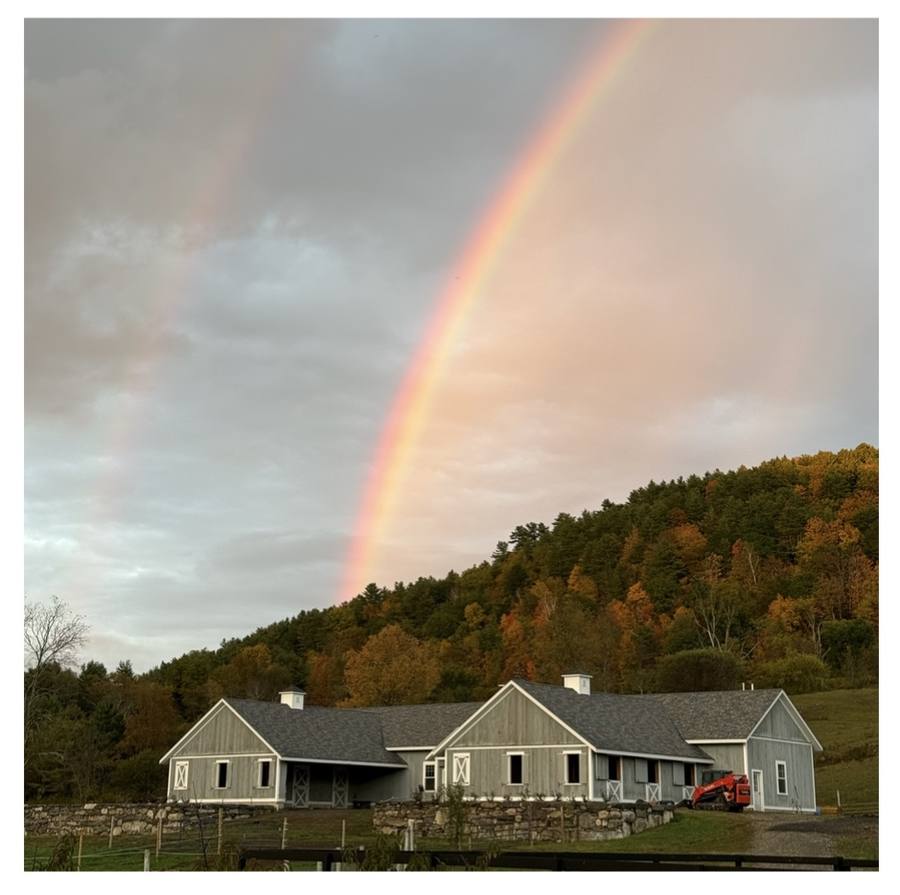 A rainbow over the farmhouse